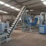 अखरोट खोलने और अलग करने का संयंत्र